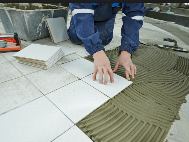 Tiling Services, broken tile replacement, wet room floor, reception area,
